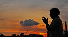 Praying-man-standing-small