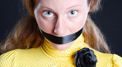 Woman mouth taped shut