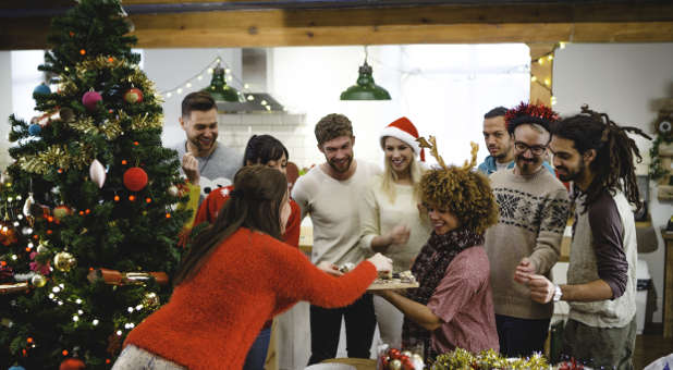 An open-house Christmas party is a good way to break the ice with your neighbors.